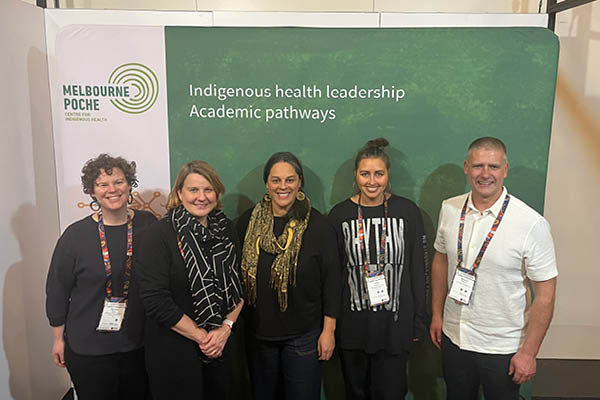 Poche team Hannah, Odette, Shawana, Tahlia and Warwick in front of the Poche stall