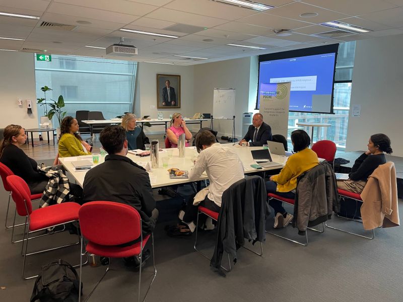 2023 cohort sitting at a table with Professor Barry Judd Deputy Vice-Chancellor (Indigenous)